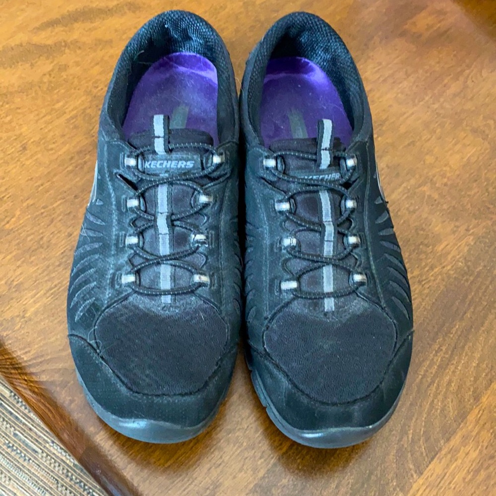 Skechers black slip on